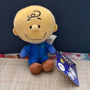Official Peanuts Charlie Brown 5.5-inch mini plush toy in a blue astronaut suit